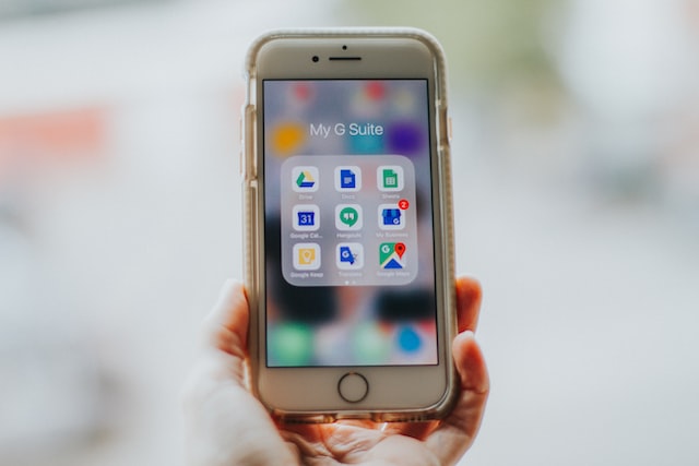 person holding silver iphone