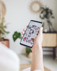 person holding white smartphone