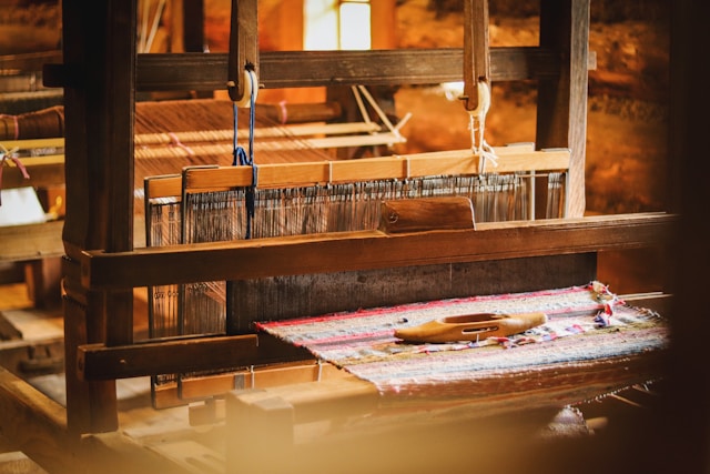a-weaving-machine-with-a-piece-of-cloth-on-it