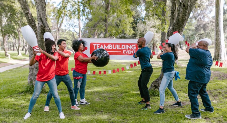 people-holding-toy-bowling-pins-and-playing-a-game